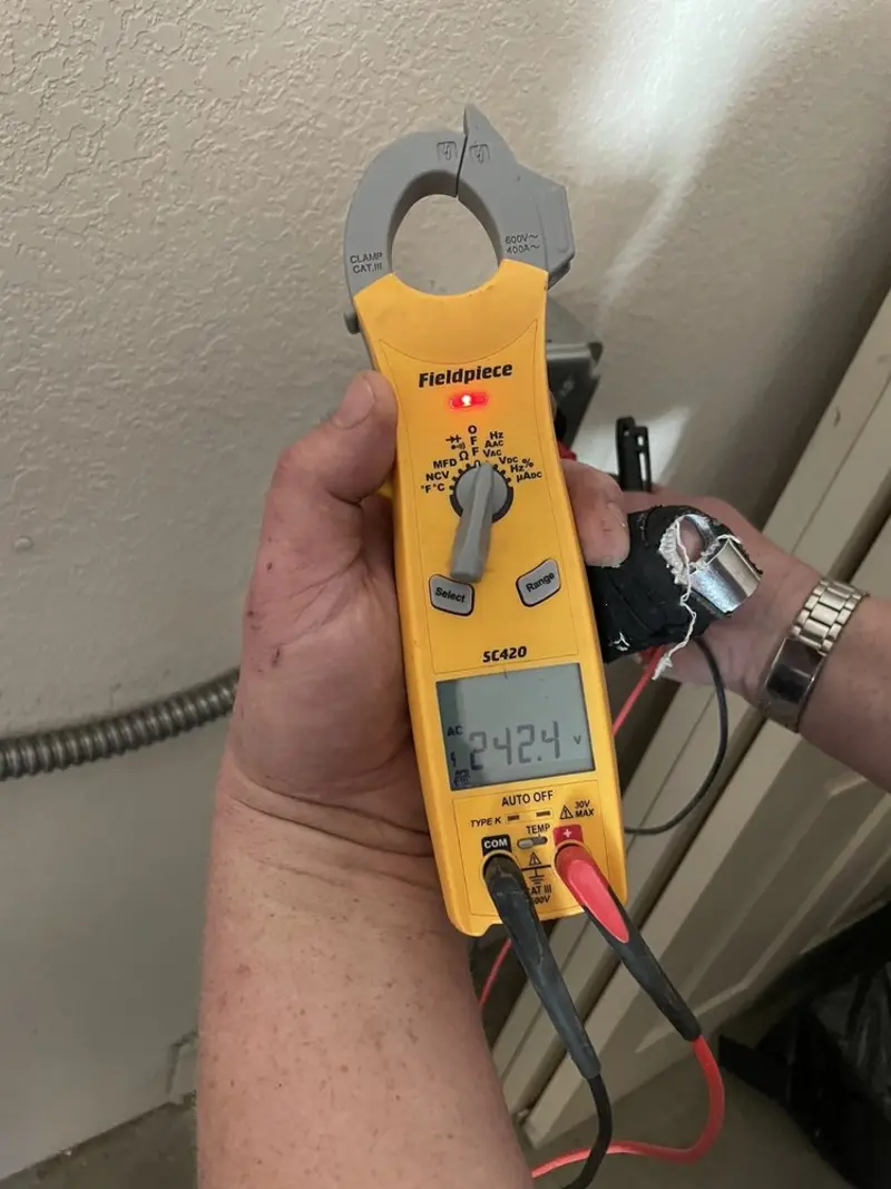 Voltage testing with clamp meter during Circuit Breaker Repair in Allenstown